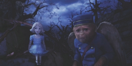 The china doll and Finley lost in the forest at night.