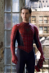 Tony Maquire in his Spiderman outfit, with the hood removed.