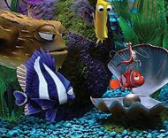 A scene from the dentist's fish tank in the movie Findiing Nemo, featuring Nemo and Flo.