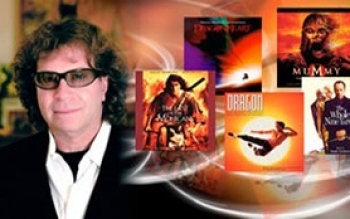 Randy Edelman with album covers from shows for which he composed music.