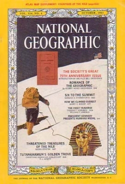 1963 cover of National Geographic showing a man hiking up a snow-covered mountain.