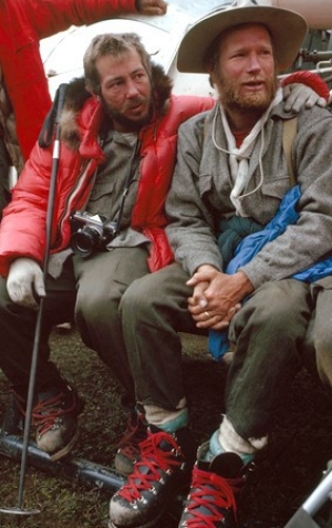 Barry Bishop, and William Unsoeld sit at the nearest base camp, waiting on the mountain.