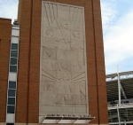 Reds relief sculpture of three batters