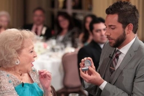 Chuck star, Zachary Levi, pulls out al ring for Betty.