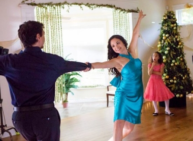 Karen Olivo and Ralph Macchio dance in the TV movie ''Holiday Spin''