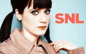 Zooey Deschanel poses for a SNL promo shot with her hair in pigtails.