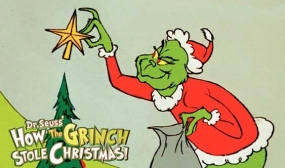 The Grinch steals a star from the tree