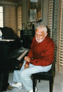Albert Hague at his grand piano