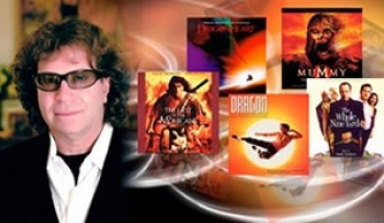 Randy Edelman with albums of soundtracks he worked on.