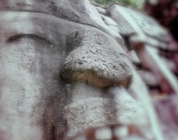 A closeup detail of a Mayan statue.