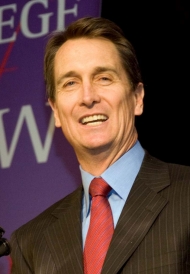 Cris Collinsworth speaking at a College of Law event.