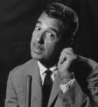 Tennessee Ernie Ford tugs on his ear