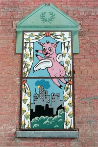 pig painting in window