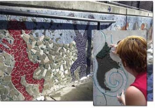 UC students and “at-risk” teens from the community worked all summer and part of the fall to complete this enormous mosaic near Findlay Market -- one of four Art in the Market projects conceptualized and created by DAAP students last year. (Woman working on mosaic is Brandon) photos/Colleen Kelley