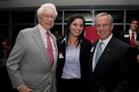 Lindner Honors-PLUS benefactor Carl Lindner greets student Rachel Bucalo and alumnus Tom Mischell, Bus '70, at a College of Business event.