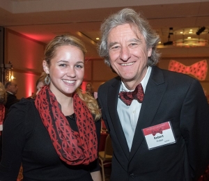 The winning designer of the University of Cincinnati bowtie design contest, Olivia Hiles, and Robert Probst, dean of the College of Design, Architecture, Art and Planning. 