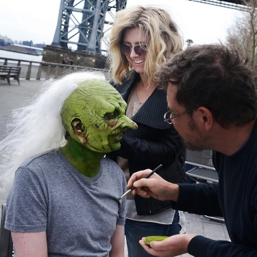 University of Cincinnati alumna and Emmy-winning hairstylist and wig designer Cara Sullivan works on a "monsters" white wig on the set of Saturday Night Live.