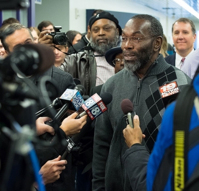 Ricky Jackson is surrounded by media microphones after his exoneration from prison after 39 years.