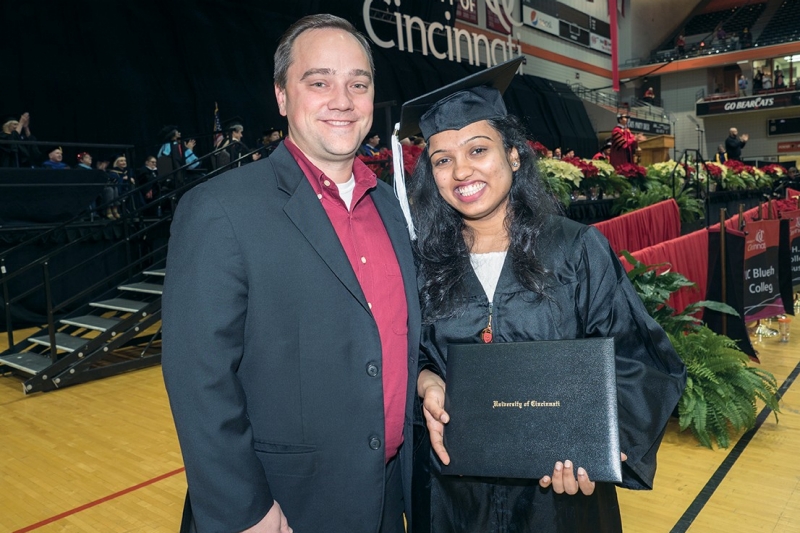 Jon Weller and Karishma Randhave at UC's commencement
