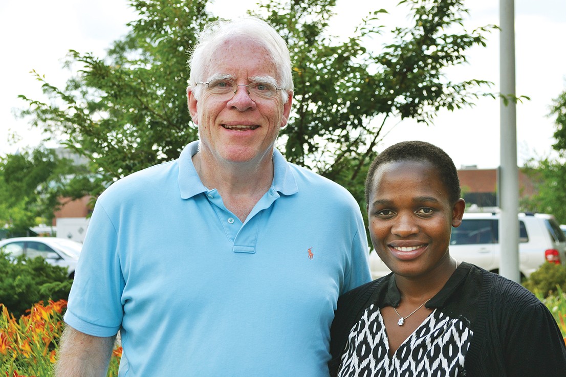 James O’Reill stands next to Maria Nakafeero.