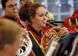 Freshmen Sarah Elam and Christian Schuster perform at the dedication.