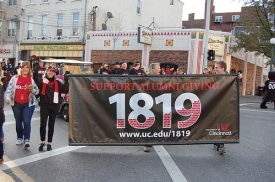 1819 banner in UC Homecoming parade.