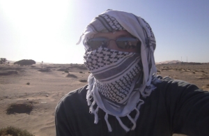 All wrapped up, UC student David Watkins was ready for a camel ride in the Sahara Desert. 