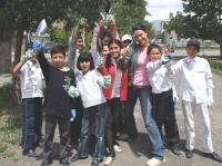 Michelle Bova in school yard where Eco-Club children (graded 5-8) were planting and cleaning up.