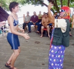 Sara Ernst dances as a farewell party for a fellow Peace Corps volunteer in El Salvador. 