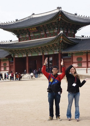 Standing in front of the Gyeongbokgung Palace in Seoul are UC students Carlo Cruz and Sarah Brown.   They and George Hakim were the only UC students selected to participate in the South Korea   Scholarship Program offered by the Council on Inter-national Educational Exchange in March 2011.   They studied at Yonsei University and traveled to historic sites. This spring, Brown is in Europe   as part of her Lindner Honors-PLUS requirements.