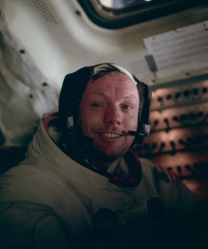 Neil Armstong wearing his spacesuit, still on the moon after the moonwalk.