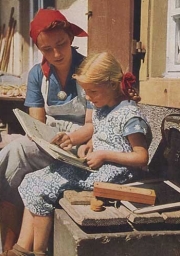 Helping a child to read.