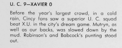 Yearbook caption reads: Before the year's largest crowd in a cold rain, Cincy fans saw a superior UC squad beat XU in the city's dream game. Mutryn, as well as our backs, was slowed down by the mud. Robinson's and Babcock's punting stood out.