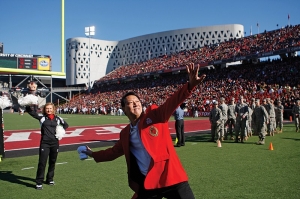 Launching T-shirts into the student section at athletics events is just one way UC’s new leader connects with his favorite constituents. He’s also been known to drop by to practice with the football and basketball teams. photo/