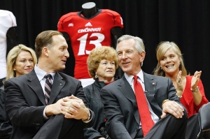 Athletics Director Whit Babcock chats with Tommy Tuberville during the press conference. photo/Lisa Ventre