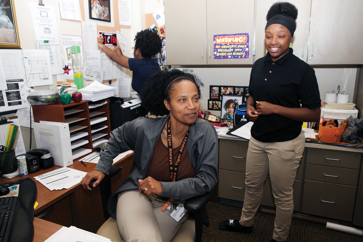 Tracey Williams, Nya Williams and Te’A Freeman in the guidance counselor's office