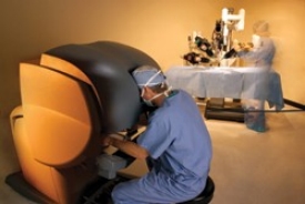 UC's recent four-arm da Vinci robotic surgical pro- cedure was the second one performed in the world.  photo/ 2006 Intuitive Surgical, Inc.