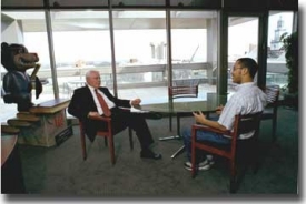 Dr. Steger and the '02-03 student body president Darren Tolliver in one of their regular meetings. -- photo/Lisa Ventre