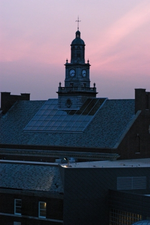 A pink sky lights the Tangeman University Center clocktower at the University of Cincinnati at sunrise.