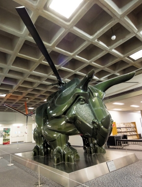 This statue looks like a dinosaur combined with a helicoptor -- because it is. Triceracoptor is displayed at UC's Langsame Library.