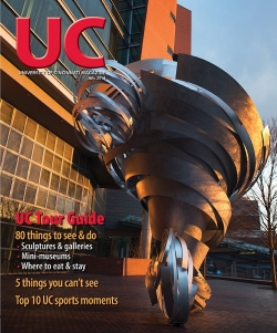 Cover of July 2014 issue features "Super Twister," a tornado sculpture near the CARE/Crawley building.
