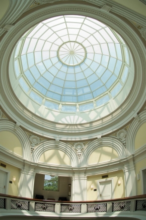 The sunlit glass dome of Van Wormer Hall casts delicate shadows on the scene below.