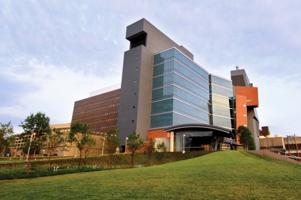 The Care Crawley building on the University of Cincinnati medical campus is a mix of glass and bricks and mortar.