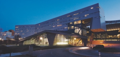 A nighttime view of the University of Cincinnati's campus recreation center.