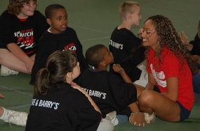UC students interact with kids from community.