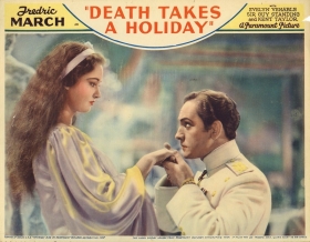 A lobby card for Death Takes a Holiday, starring Venable and Fredric March.