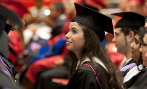 a female graduate in her cap and gown