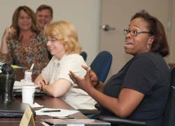 Participants from summer 2012 take part in a class discussion.