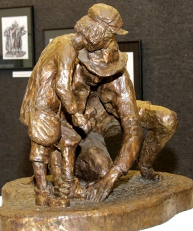 At Rolat's exhibit was a touching bronze sculpture of a father untying his son's shoes.