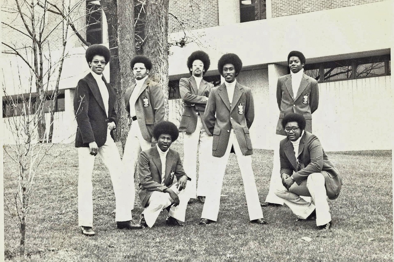 In the 1970s, a group of African-American men gather for a stylin' photo.r